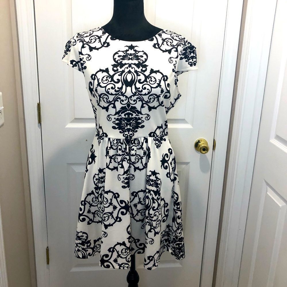 B. Darlin black and white sheer back cap sleeve dress